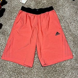 Adidas shorts, size small, color pink.